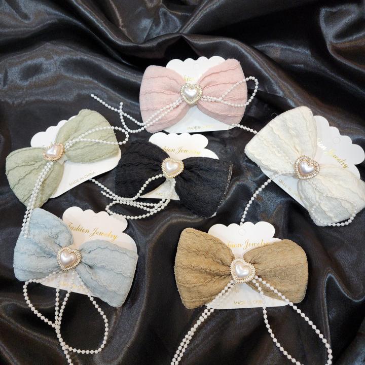 Celeste Bow Clip - Noir Elegance